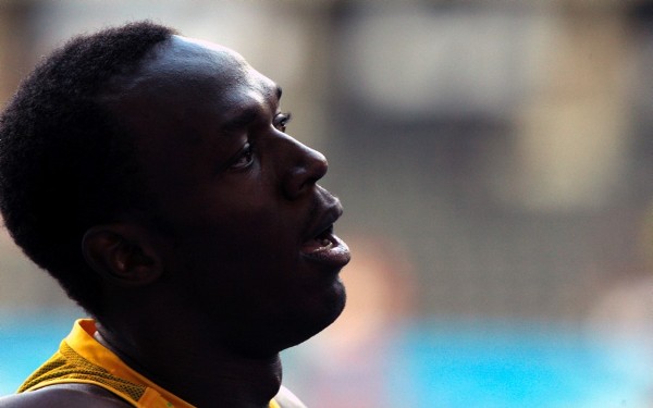 El atleta jamaicano Usain Bolt tras competir en una serie de la primera ronda de la prueba de los 200 metros 
