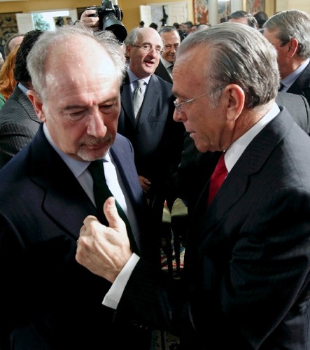 Los presidentes de Caja Madrid, Rodrigo Rato (i) y de la Caixa, Isidre Fainé.