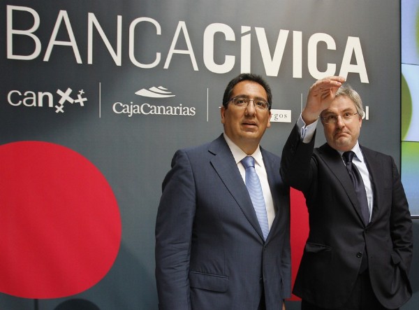 Los copresidentes de Banca Cívica, Antonio Pulido (i) y Enrique Goñi, durante la presentación esta mañana ante analistas la salida a bolsa de la entidad el próximo 20 de julio.