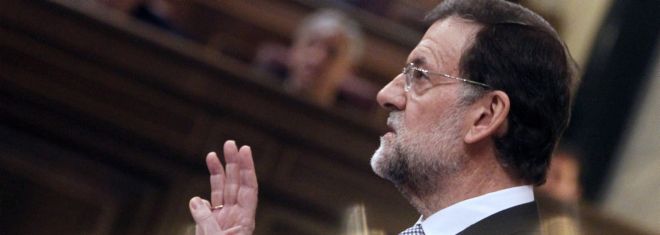 El líder del PP, Mariano Rajoy, durante su discurso en la primera sesión del debate para su investidura como presidente del Gobierno, en la que ha expuesto los detalles de la acción que pretende llevar a cabo al frente del Ejecutivo.