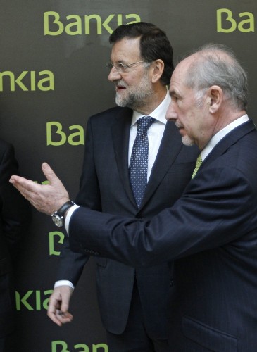 El presidente del Gobierno, Mariano Rajoy, y el presidente de Bankia, Rodrigo Rato (d) en una foto de archivo.