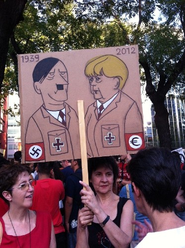 Protesta contra la visita de Merkel a Madrid.