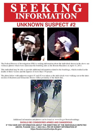 Fotografía cedida por la Oficina Federal de Investigación (FB) de un cartel de se busca donde aparecen las imágenes de los sospechosos.