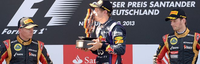 Vettel, junto a los otros dos mejores clasificados del GP de Alemania.