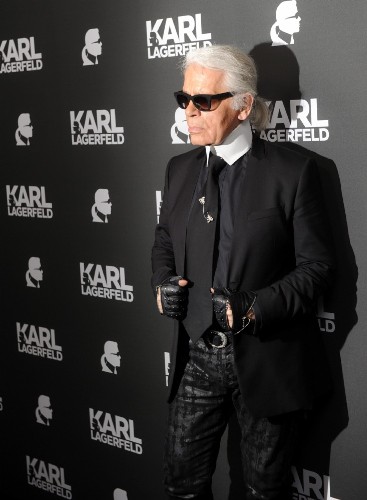 El diseñador alemán Karl Lagerfeld llega al evento de apertura de su nueva tienda Karl Lagerfedl, el pasado miércoles 4 de septiembre de 2013, en Munich (Alemania). 