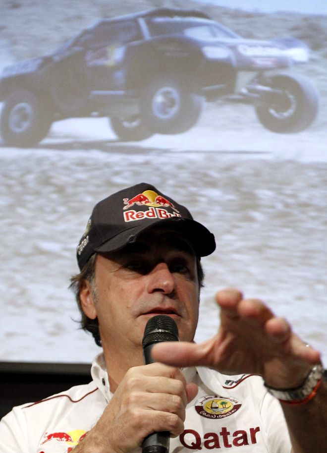 El piloto de coches Carlos Sainz (i), vencedor del Dakar en 2010.