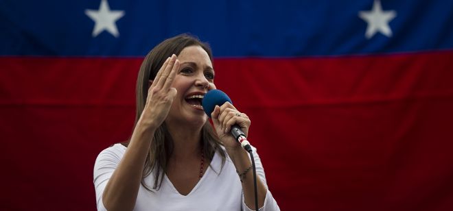 La diputada venezolana y dirigente de oposición, María Corina Machado, participa en una manifestacion contra el Gobierno de Nicolás Maduro. Dirigentes de la oposición venezolana exigieron a la Organización de Estados Americanos (OEA) la activación del mecanismo interamericano y una reacción 
