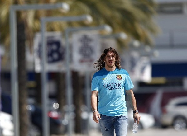 El capitán del Barcelona, Carles Puyol, se dirige a la rueda de prensa .
