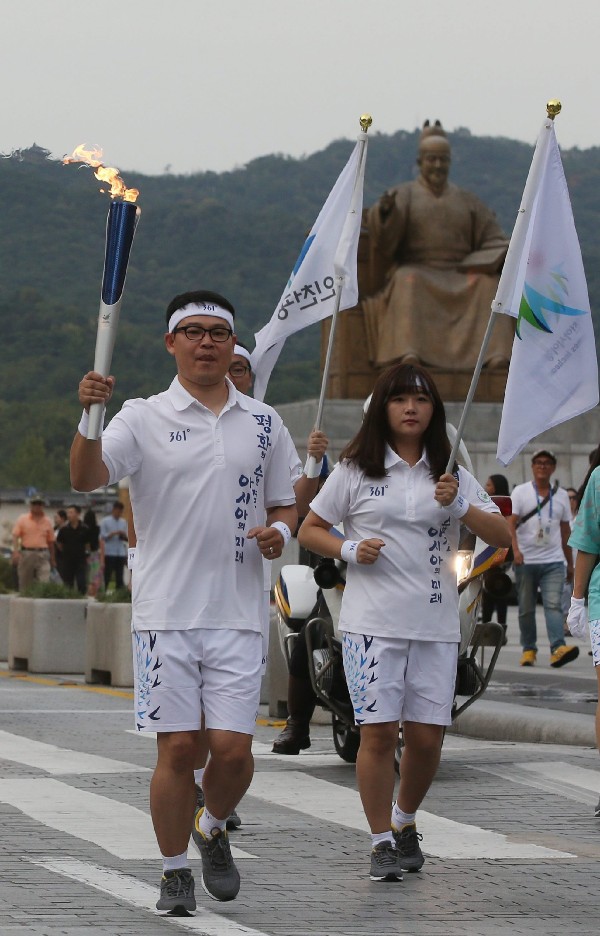 La antorcha de los Juegos de Asia, que acabarán el 4 de octubre, llegó el martes 16 de septiembre de 2014 a Seúl (Corea del Sur).
