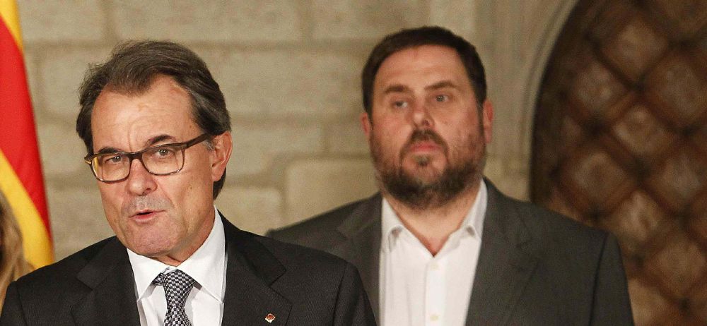 El presidente de la Generalitat, Artur Mas (i) y el presidente de Esquerra Republicana, Oriol Junqueras (d).