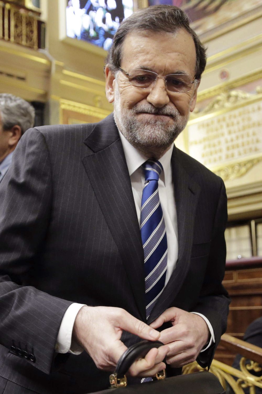 El jefe del Ejecutivo, Mariano Rajoy poco antes del inicio en la Cámara Baja del vigésimo quinto debate del estado de la nación.