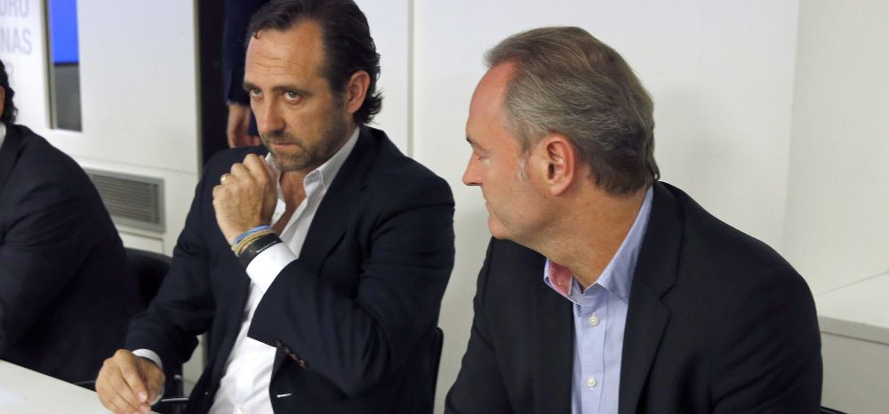 Los presidentes autonómicos de Baleares, José Ramón Bauzá (i) y Valencia, Alberto Fabra, asisten a la reunión del Comité Ejecutivo Nacional del PP para analizar los resultados electorales.