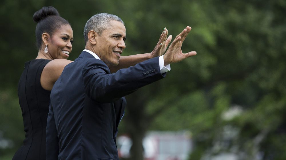 El presidente estadounidense Barack Obama (d) y la primera dama Michelle Obama (i).
