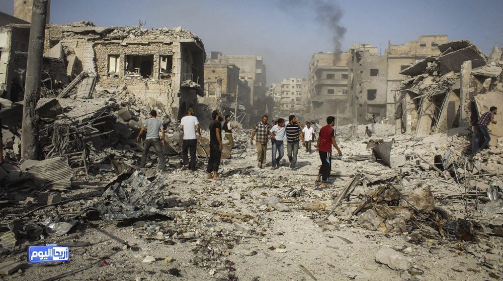 Edificios destruídos tras un bombardeo en Ariha, Siria, el pasado lunes por parte de aviones del régimen.