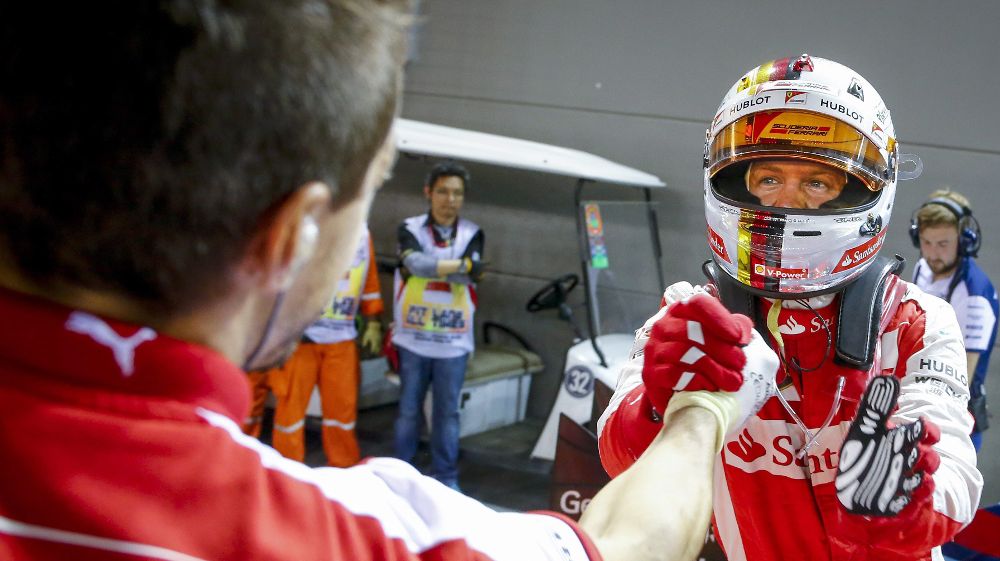 Sebastian Vettel (d).