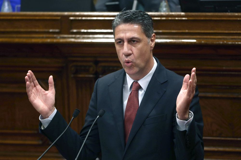 El presidente del grupo parlamentario del PPC, Xavier García Albiol, durante una intervención en el pleno del Parlament de Cataluña.