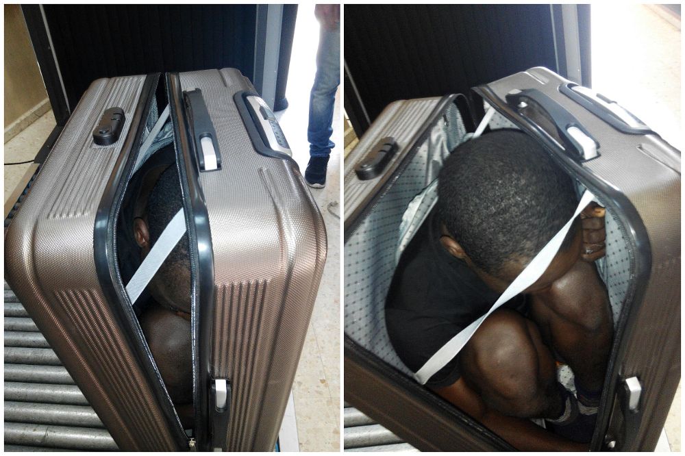 Imagen facilitada por la Guardia Civil de la maleta con el subsahariano que iba dentro.