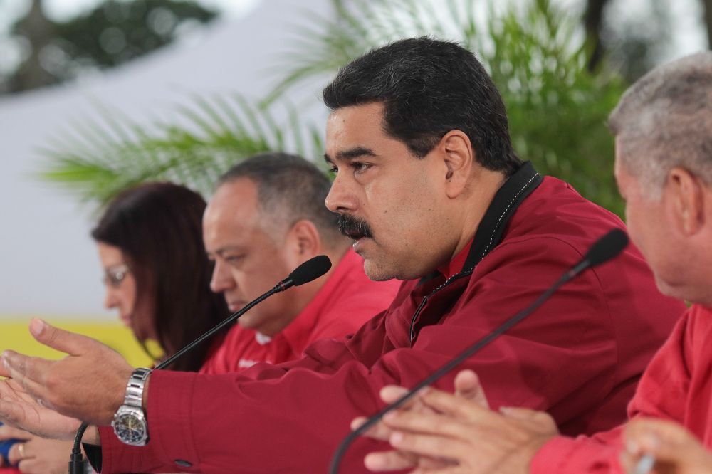 Nicolás Maduro (c).