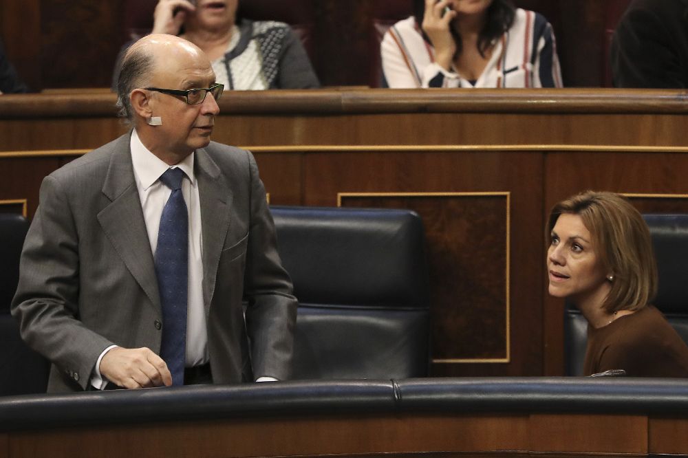 El ministro de Hacienda, Cristóbal Montoro, durante el debate de convalidación del Real Decreto Ley de reforma de la estiba que se ha celebrado hoy en el pleno de la Cámara baja.
