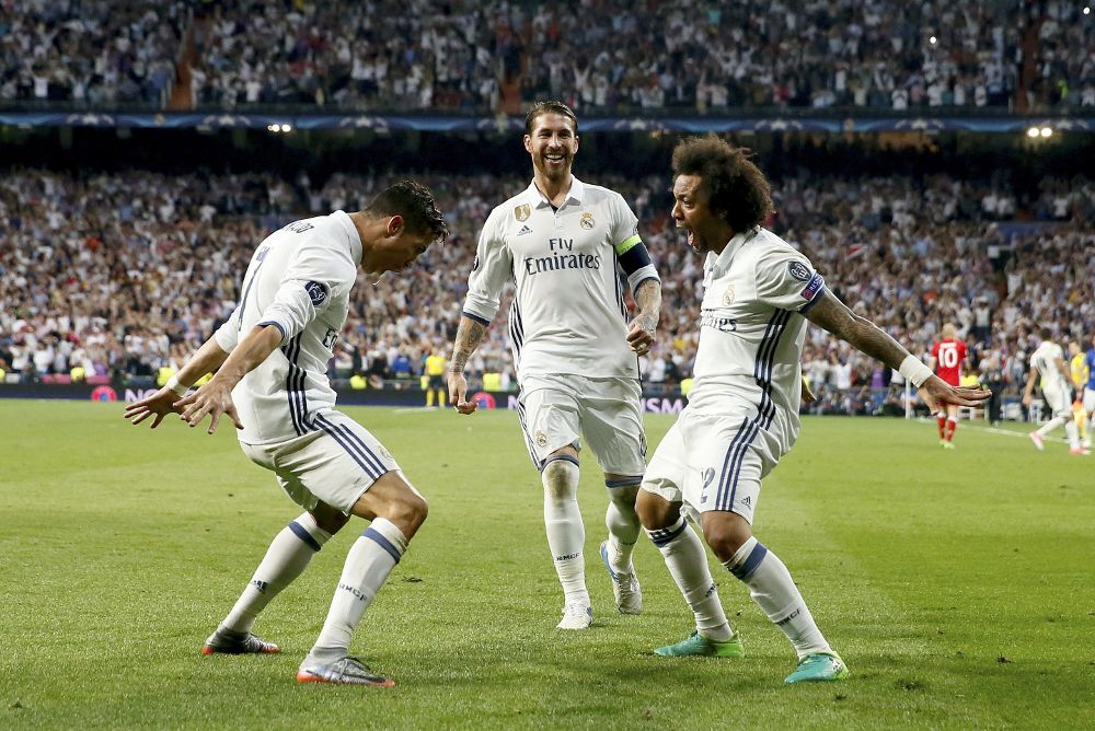 Los jugadores del Real Madrid (i-d), el portugués Cristiano Ronaldo, Sergio Ramos y el brasileño Marcelo Vieira da Silva.