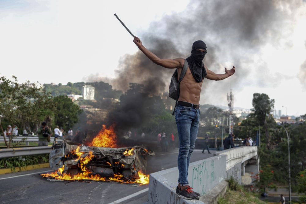 Manifestación contra el Gobierno venezolano, ayer, lunes, en Caracas.
