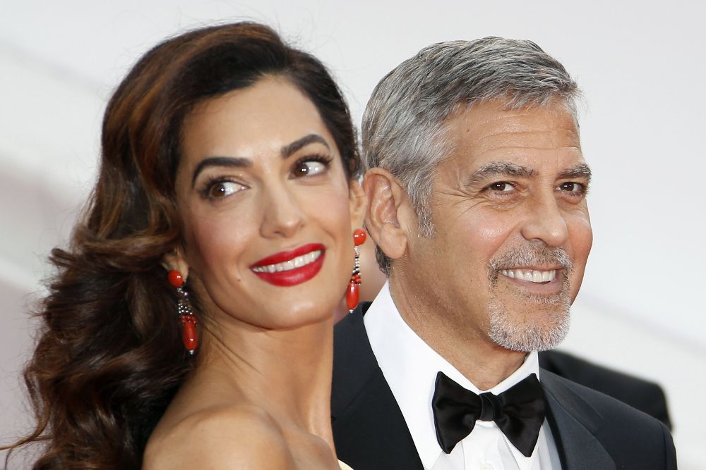 George Clooney y su mujer, la abogada británica Amal Clooney.