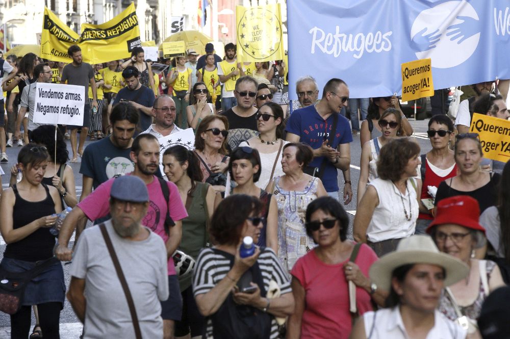 Un momento de la manifestación en Madrid, que ha partido a la siete de la tarde de la plaza de Cibeles para concluir en la de España.