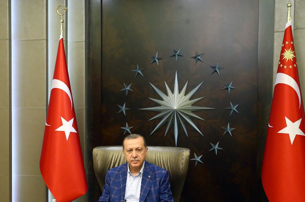Recep Tayyip Erdogan (C).