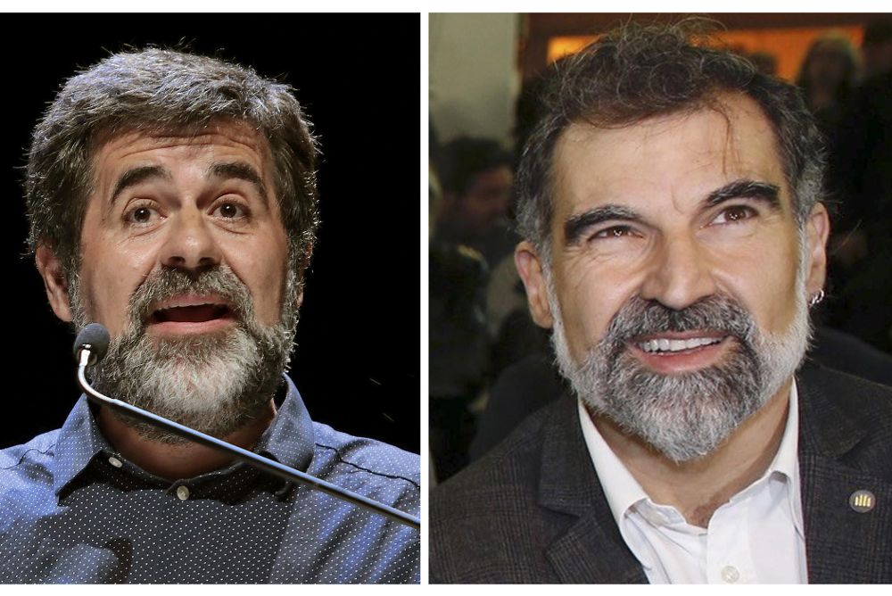 El presidente de la Asamblea Nacional Catalana (ANC), Jordi Sànchez, y el de Òmnium Cultural, Jordi Cuixart (dcha).