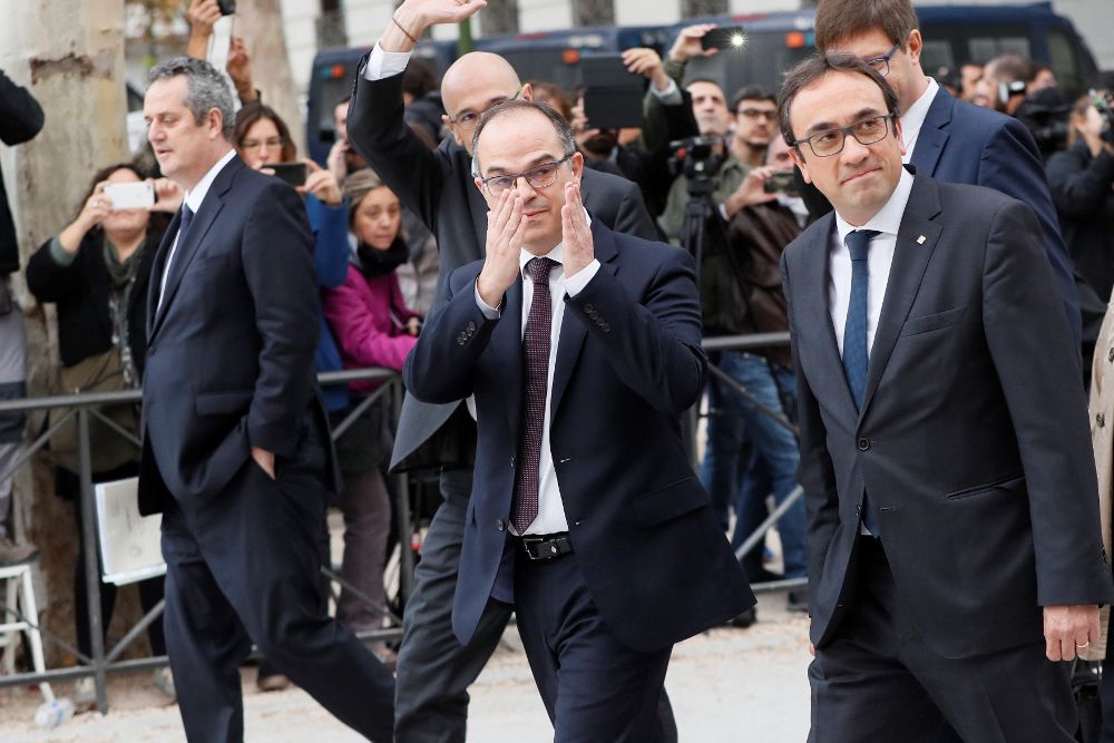 Los exmiembros del Govern (de dcha a izqda.) Josep Rull y Jordi Turull el día que declararon ante la Audiencia Nacional.