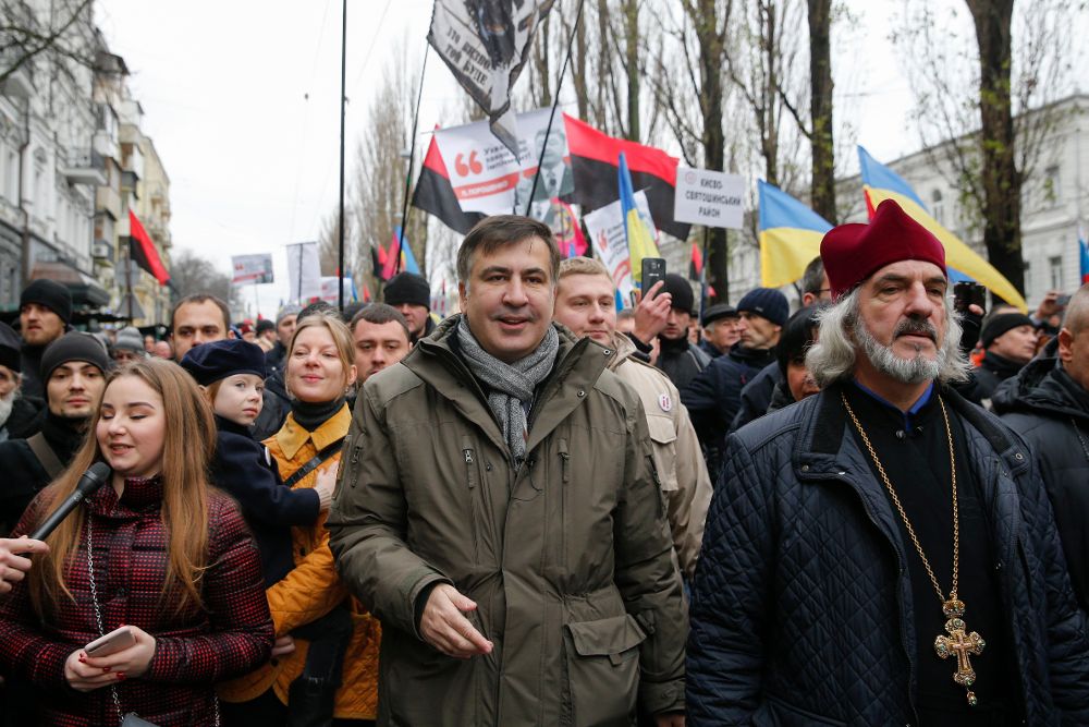 Saakashvili (C).