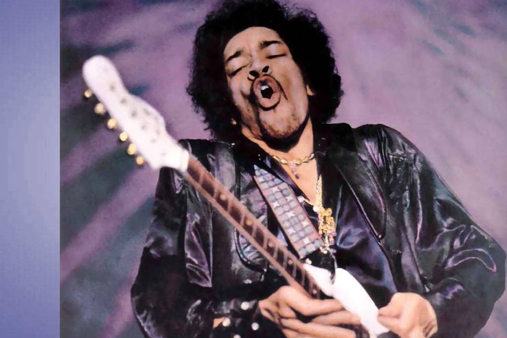 Jimi Hendrix haciendo un solo de guitarra.