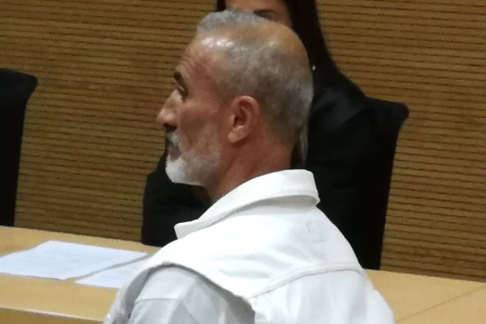 2018 Foto del acusado de matar a golpes a un indigente, durante la sesión judicial.