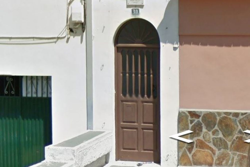 Casa donde han aparecido los cuatro cadáveres, en la calle Cruz de los Martillos.
