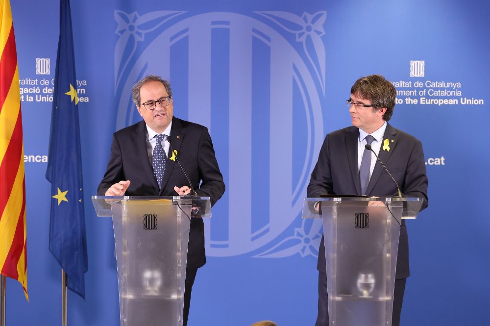 El presidente del Govern, Quim Torra, con el expresidente Carles Puigdemont.