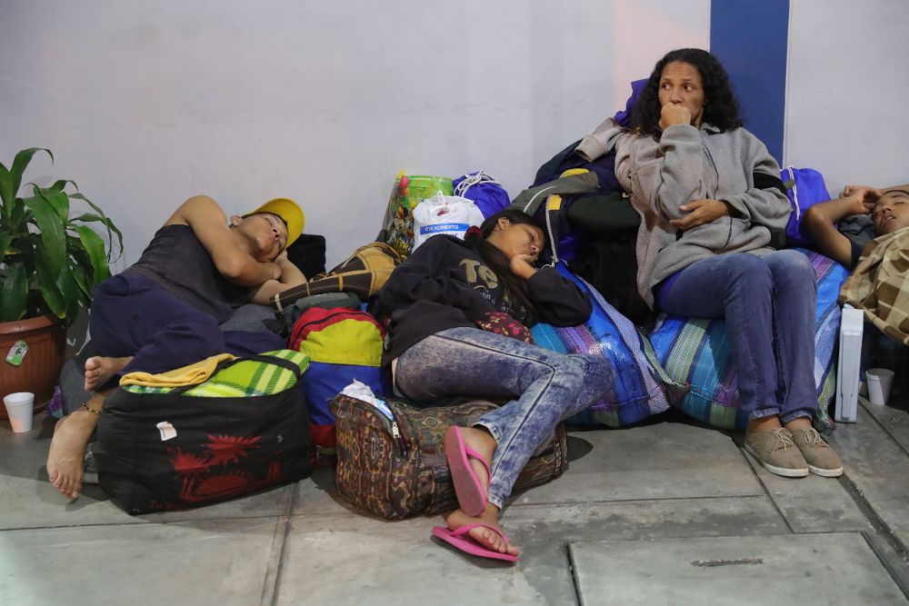 Inmigrantes venezolanos en la frontera con Ecuador.