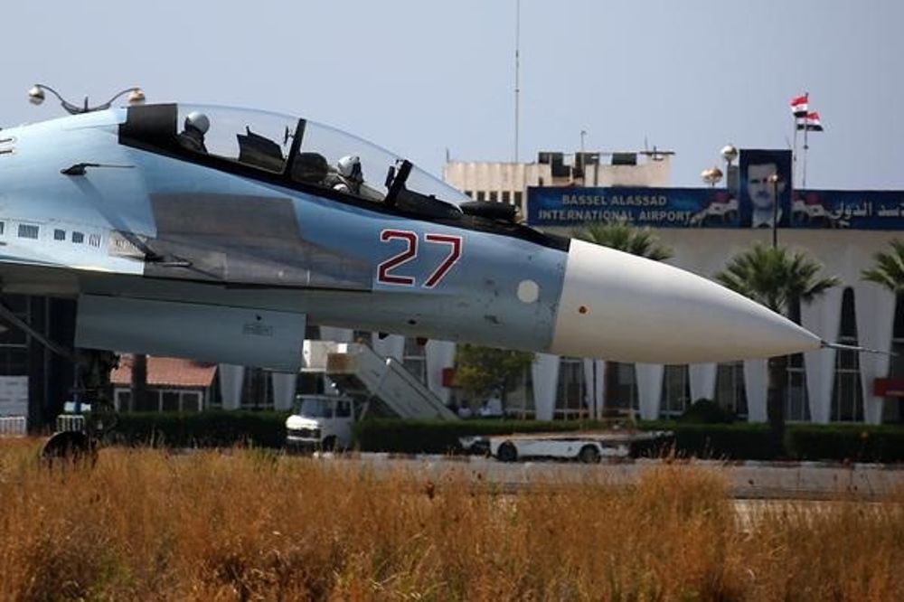 Un caza Sujoi Su-30M de la Fuerza Aérea rusa en el aeropuerto Bashar al Assad de Latakia, en Siria.