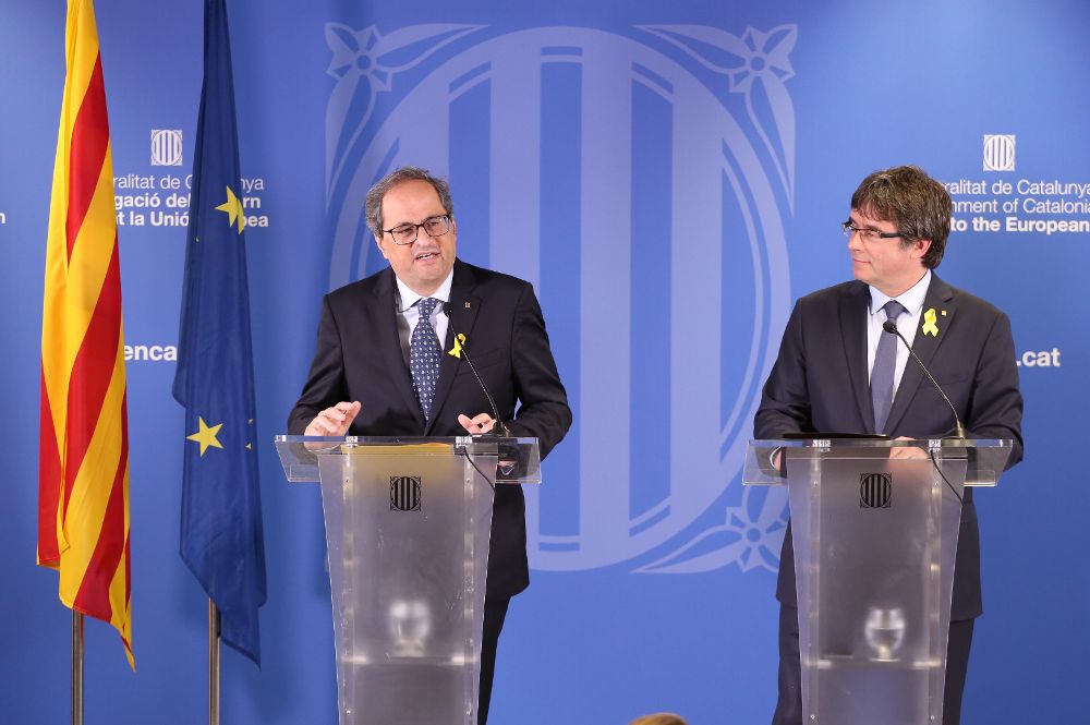El presidente del Govern, Quim Torra, con el expresidente Carles Puigdemont. 