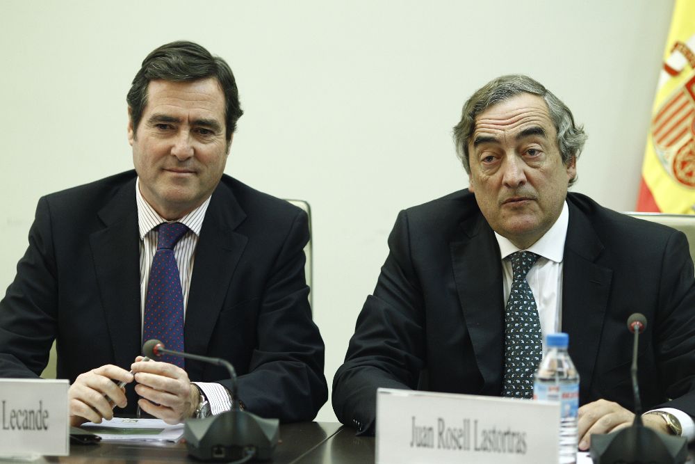 Juan Rosell y Antonio Garamendi (i).