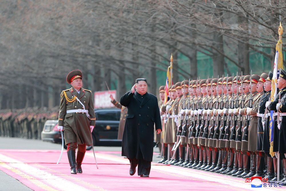 Kim Jong-un (C).